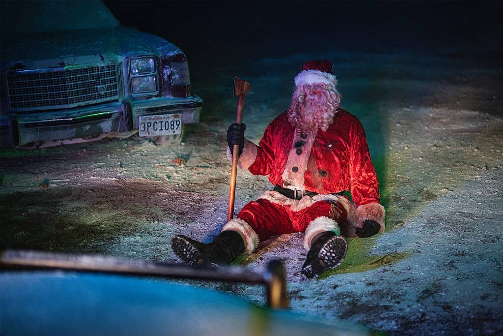 Robo Santa (Abraham Benrubi) prepares to slay in Christmas Bloody Christmas (2022)